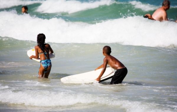 bodyboarders in the surf at foz do Lizandro