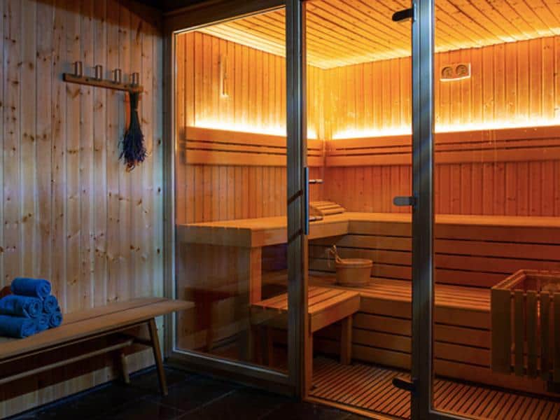 Sauna at You and the Sea all lit up at night.