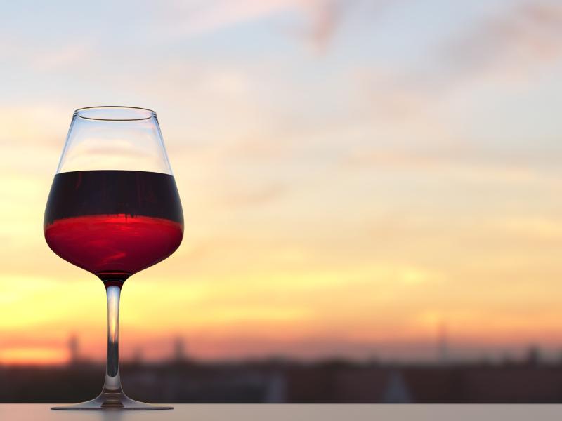 Glass or red wine and the horizon.