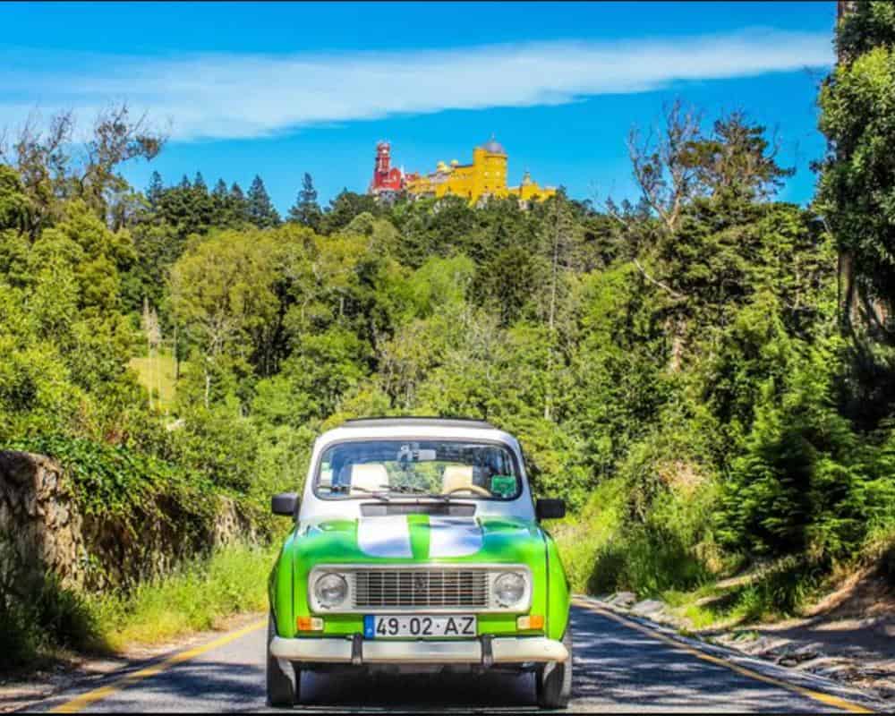The classic lime-green Renault 4L used to tour Sintra.