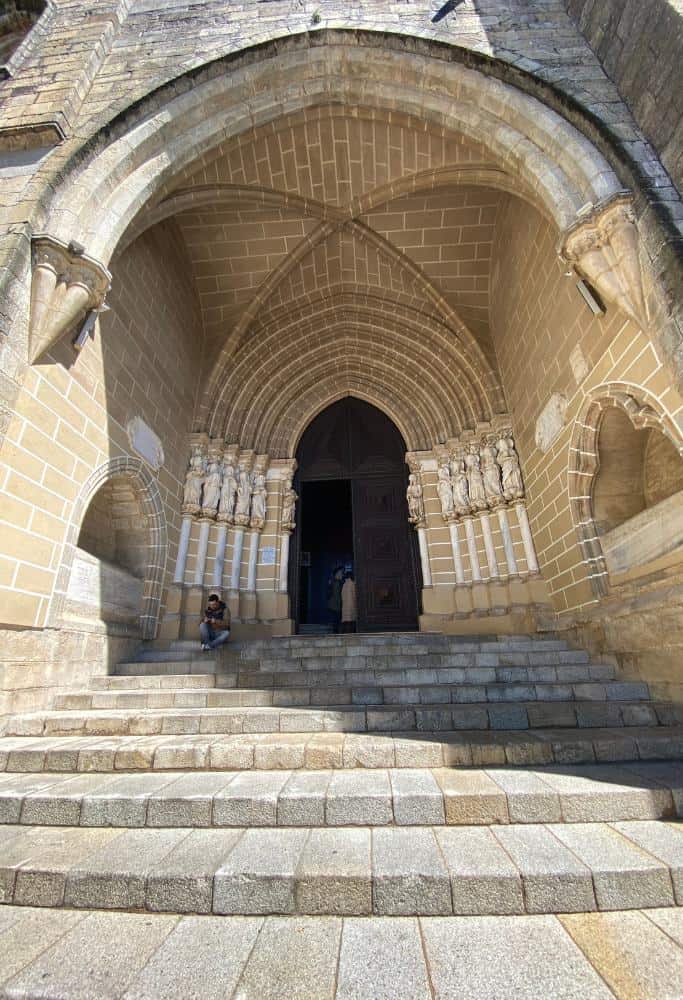 The Evora Cathedral entrance on a sunny day.