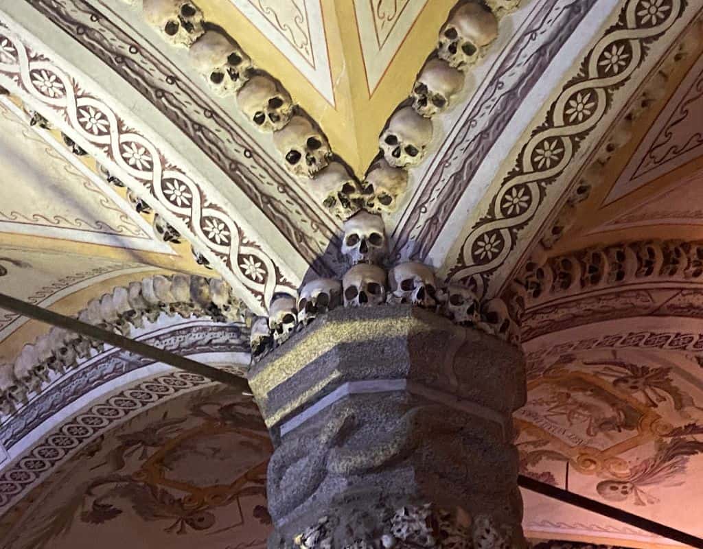 Some detail from one of the main pillars in the chapel of bones, decorated with skulls and long bones. 