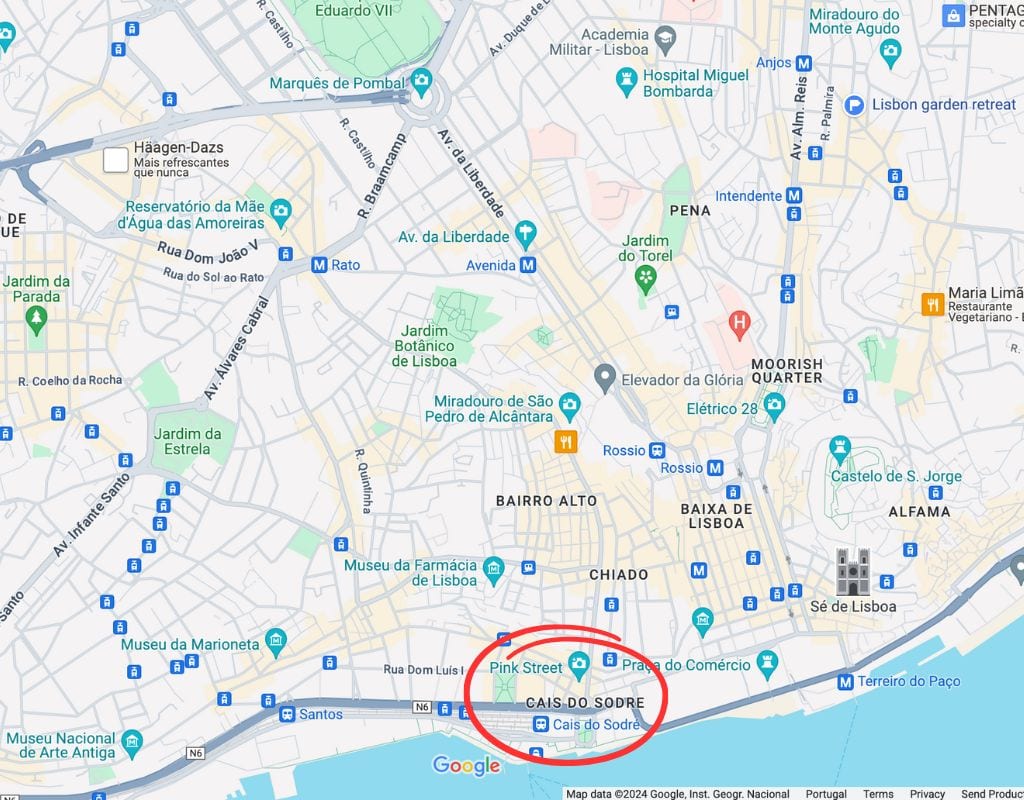 A map of Lisbon, Portugal, highlighting various landmarks and neighborhoods. The Cais do Sodre area is circled in red, located near the bottom center. 