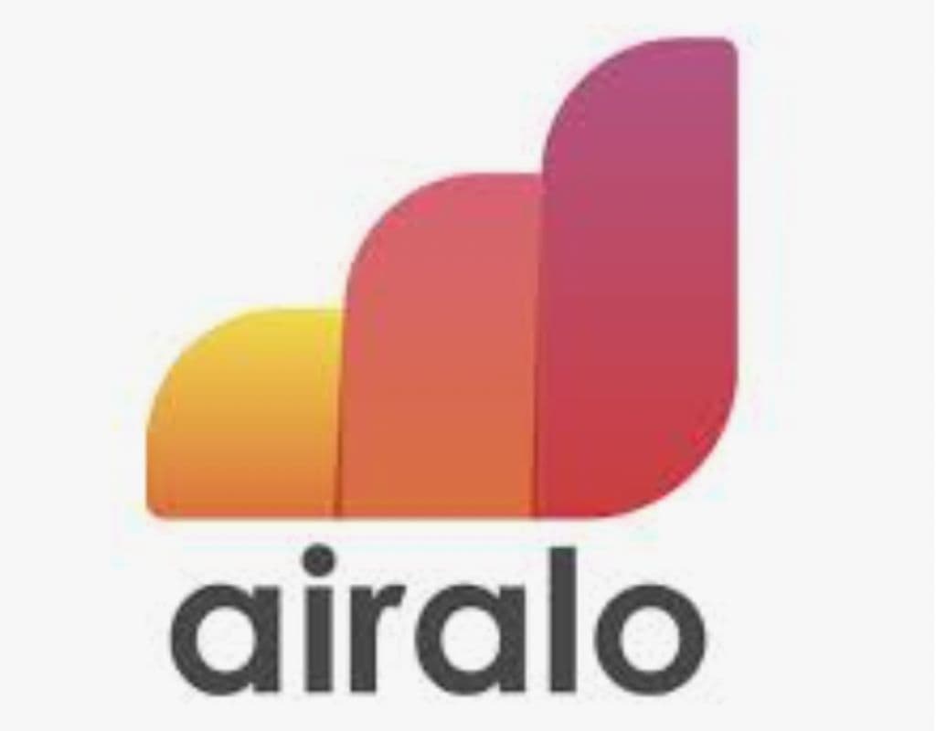 A sleek gradient logo in red, orange, and yellow for Airalo, an eSIM service that provides global connectivity, including options like a Portugal SIM Card for international travelers.